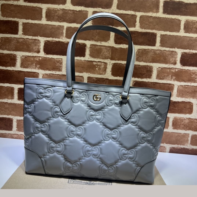 G*u*i shopping bags